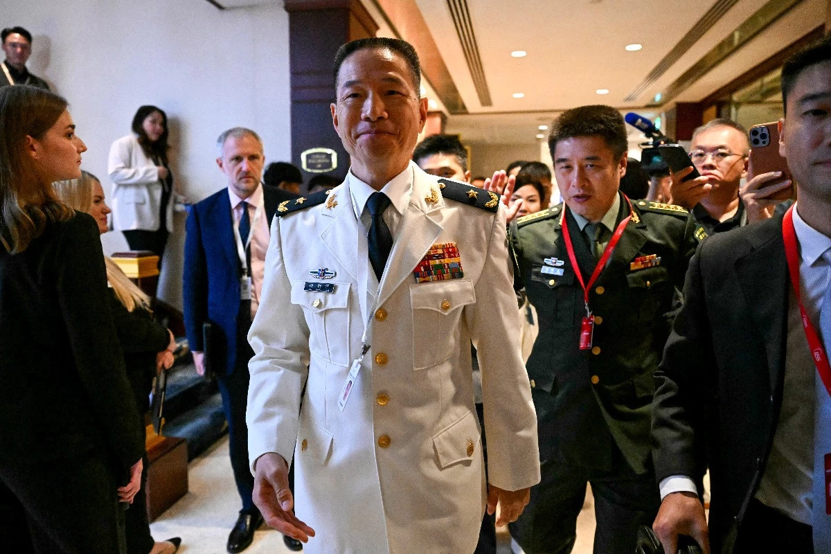 China dismisses comments by Macron, Hegseth in Singapore
