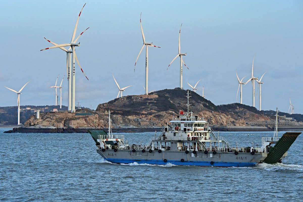 World's first floating wind power-fishery integrated platform built in east China